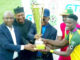 minister of sports, john enoh, nff president, alhaji ibrahim gusau hand over federation cup trophy to el kanemi warriors’ captain