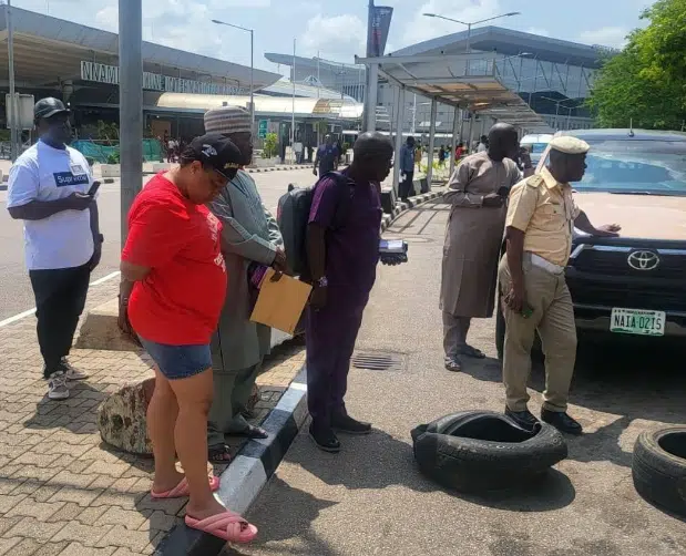 Lady who tore husband's international passport arrested