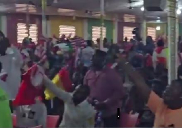 Moment members Of A Church In Ghana Pray With Passport And Flag Of Country They Want To Relocate To