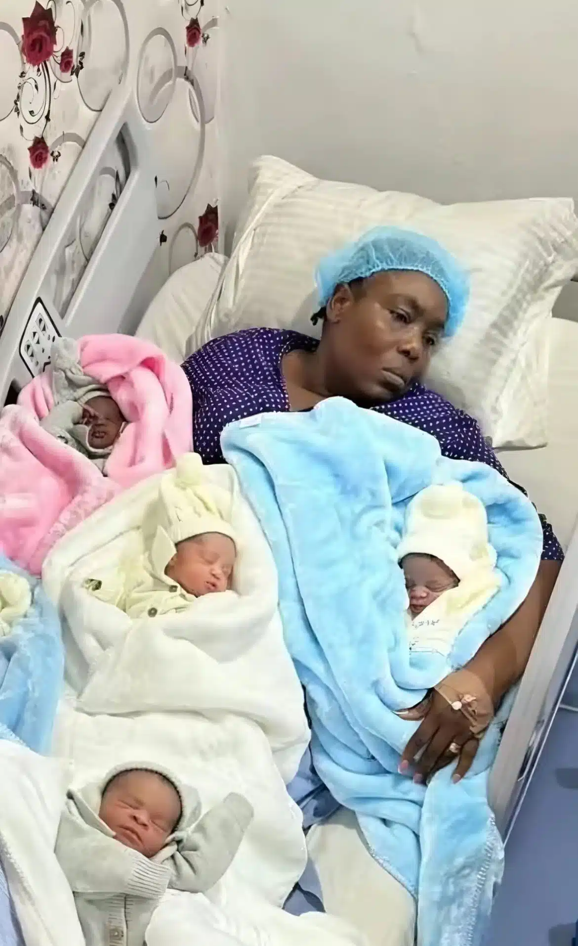 Woman's facial expression stirs sympathy after welcoming sextuplets