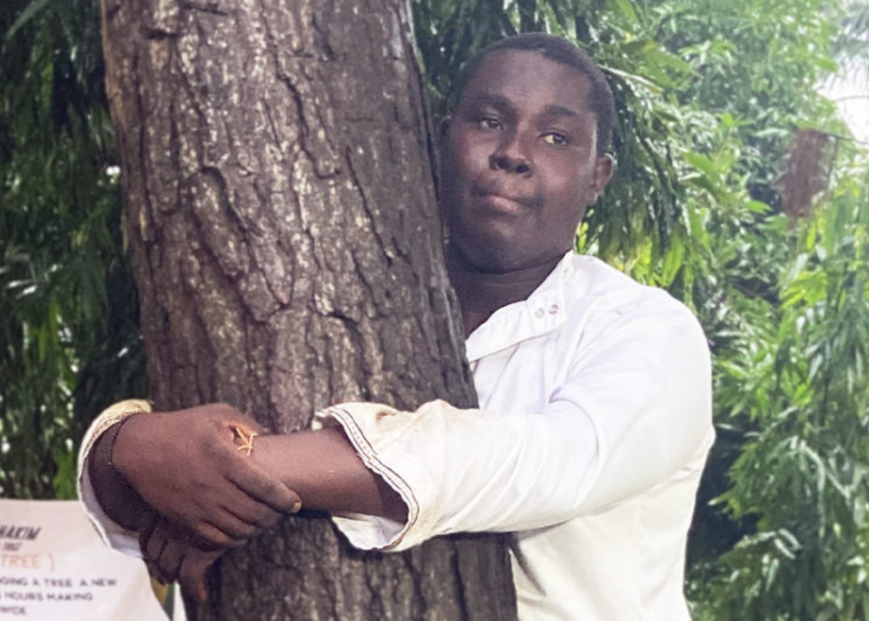 Journalist hugs tree for over 24 hours to break Guinness world record