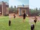 "That girl wey wear skirt na better baller" – Young ladies show off mind-blowing football skills under the rain (WATCH)