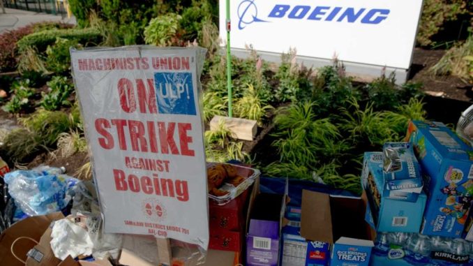 Boeing suspends negotiations with striking workers