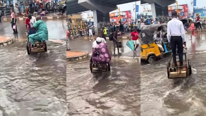 "Lagos, A state for hustlers" – Truck pusher unveils hustling spirit as he transports passengers amid fl00d in Computer Village, Ikeja (VIDEO) 