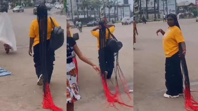 "Attachment nor cost for your side?" – Nigerian Lady's Extra-Long Braids Cause a Stir on the Streets of Benin City (VIDEO)