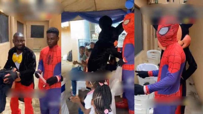 "From the law to spiderman" – First class law graduate turns into party 'Spiderman' for daily bread amid economic h@rdship (VIDEO)