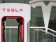 Tesla shares jump as profits rise on lower expenses