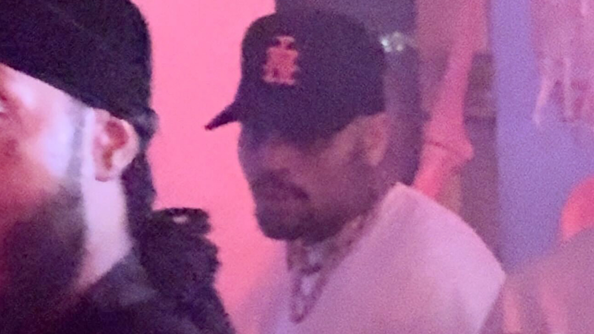 Chris Brown parties 'without a care' at Halloween mansion bash in LA after woman claims he 'raped her on Diddy's yacht'