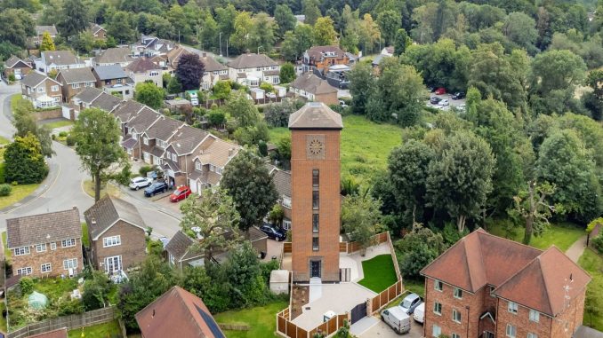 Incredible 5-bedroom home inside old 1930s water tower hides Willy Wonka-esque secret inside - & it’s every kids’ dream