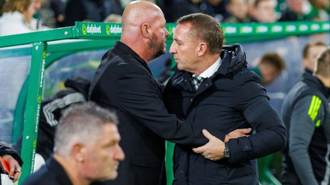 Emotional moment Celtic legend's son is embraced by Brendan Rodgers during late father's tribute