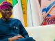 "3rd Term Stunts": Mixed Reactions as Gov Sanwo-Olu Eats 'Boli' on Lagos Street