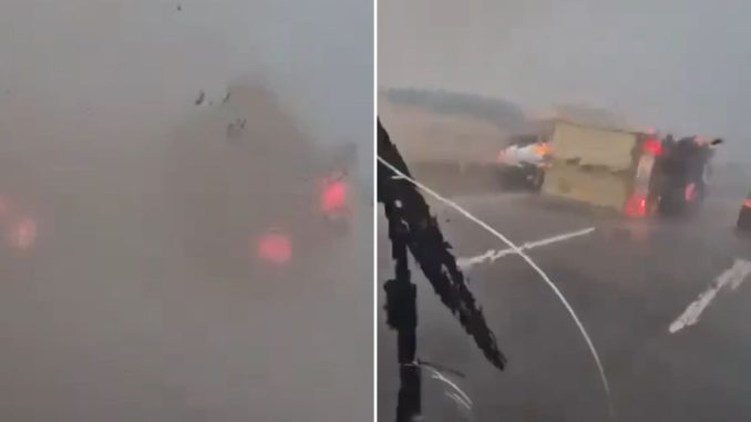 Horror moment TORNADO topples lorries in Spain during deadly floods as trucker filming vid screams ‘I’ve s**t myself’