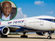 Airpeace aircraft on the tarmac with a picture of the airline CEO, Allen Onyema