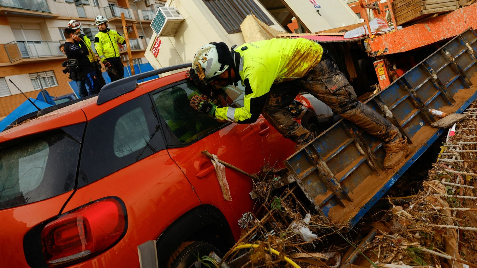 Almost 2,000 reported missing in Valencia amid Spain flood disaster as frantic families hunt for relatives