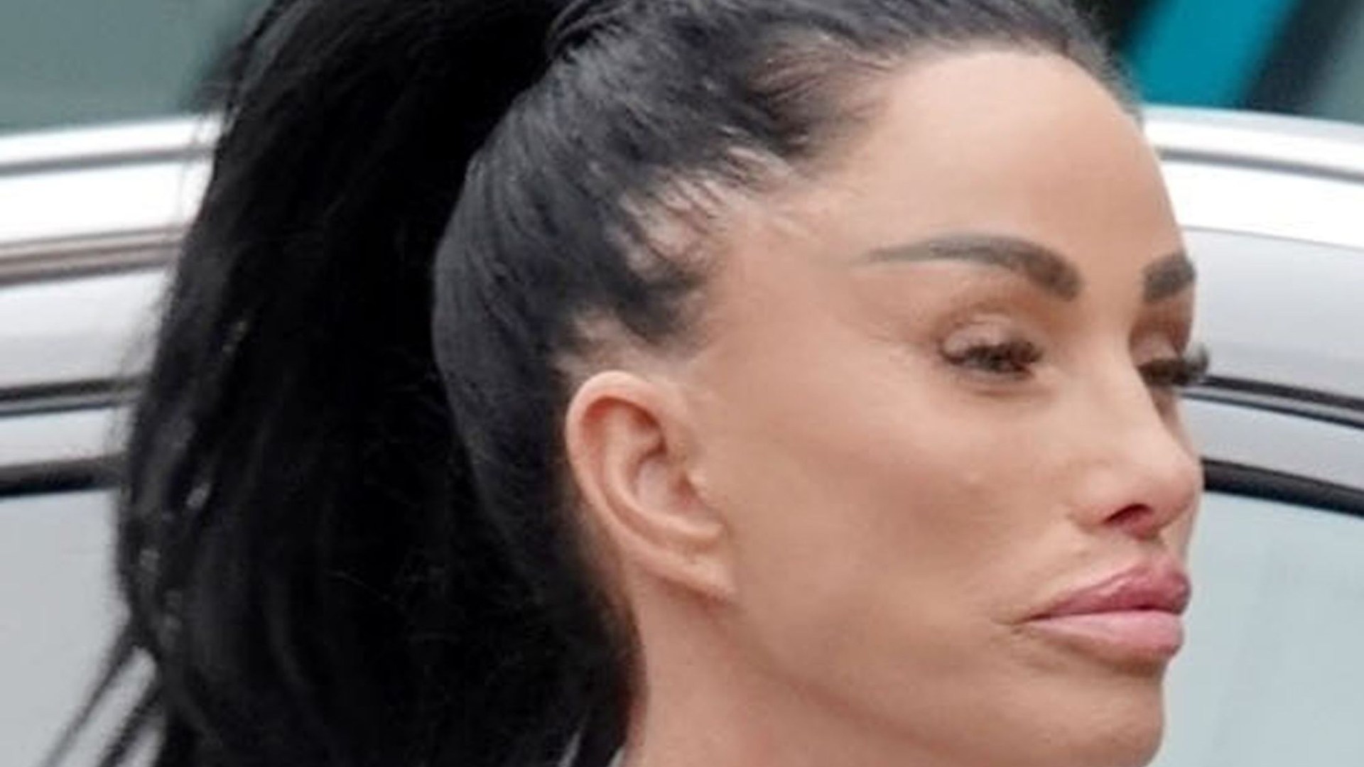 Katie Price shows off very stretched £10k facelift so tight it looks PAINFUL as she shops in London