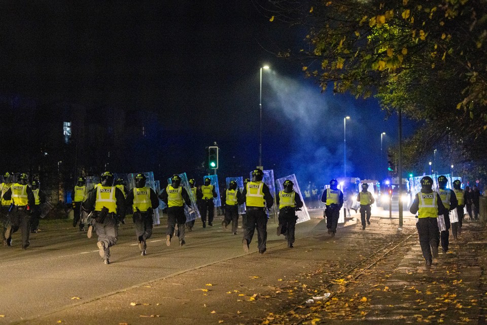 Riot cops were deployed in Edinburgh last night as Bonfire Night carnage started