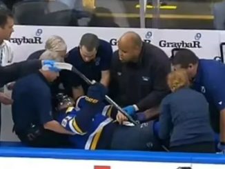 Terrifying moment NHL star Dylan Holloway is rushed to hospital as he collapses mid-game after being hit in neck by puck