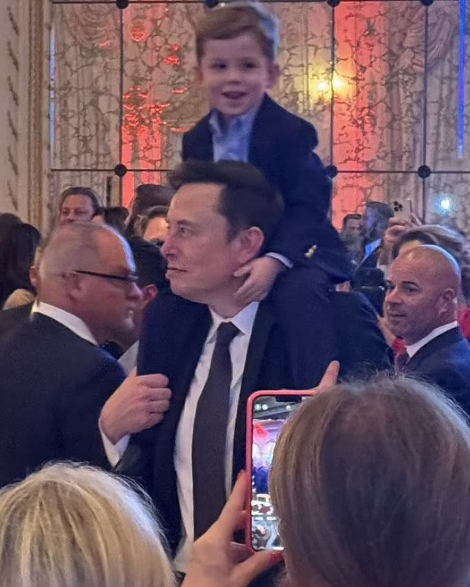 Elon Musk with his four-year-old son X at his election watch party