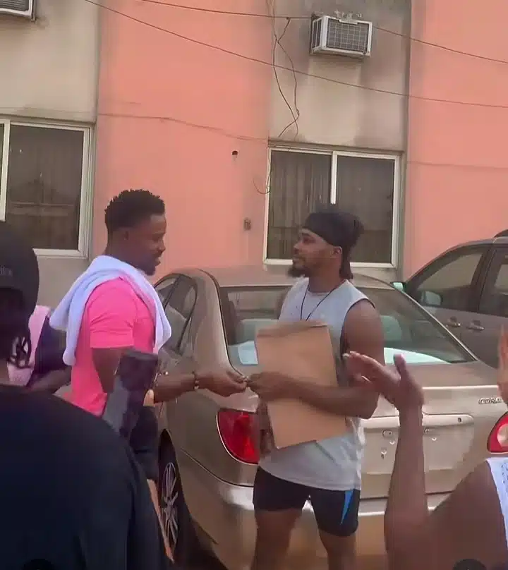 Emotional moment gym members surprise their instructor with new car 