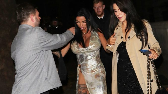 Katie Price looks ready for bed as she stumbles out of boozy party after snogging Big Brother star