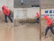 Lady gets stúck in mud, loses slipper while avoiding muddy water on street (WATCH)