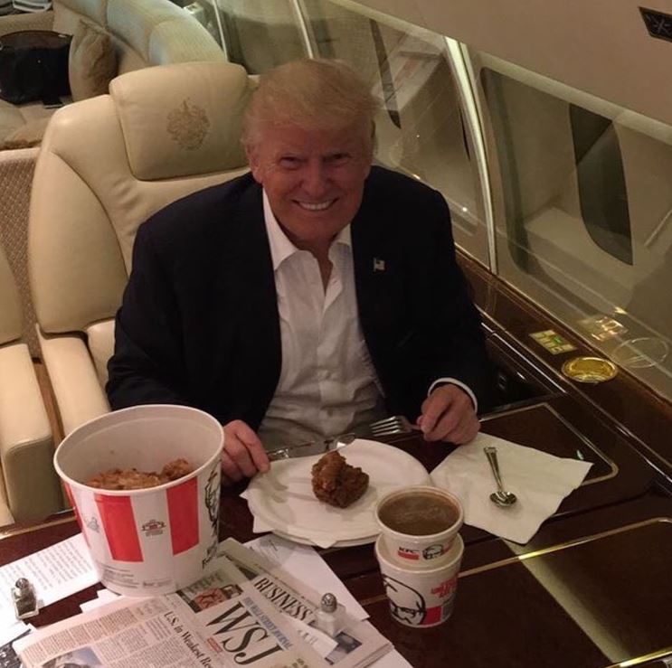 Trump eating KFC on his private jet