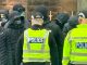 Balaclava-clad protesters 'guard Catholic Church' amid passing Loyalist march