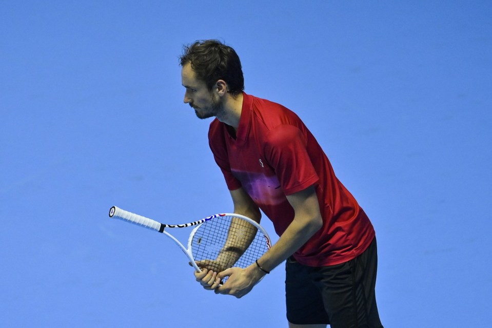 Medvedev bizarrely turned his racket upside down for a point against Fritz