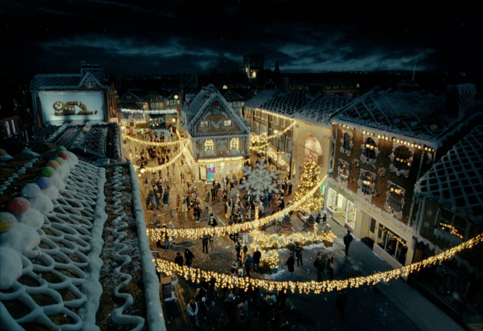 We see the town transformed into magical Gingerbread land