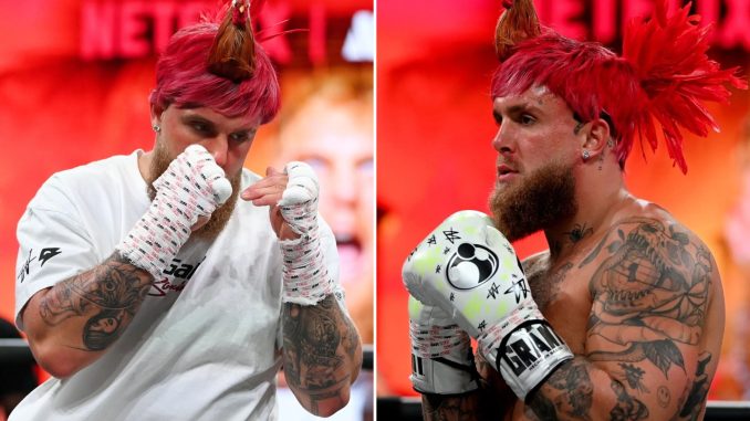 Jake Paul shows off dramatic new look by wearing ROOSTER hat in open workout for Mike Tyson fight