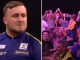 Luke Littler plays the showman at the Grand Slam of Darts as he misses out on record-breaking 9-darter by millimetres