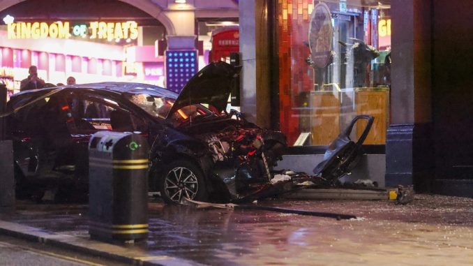 Horror as car crashes into crowded street outside busy London restaurant as 3 rushed to hospital