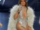 Jennifer Lopez looks incredible in plunging leotard as she performs at fashion show with Celine Dion and Halle Berry