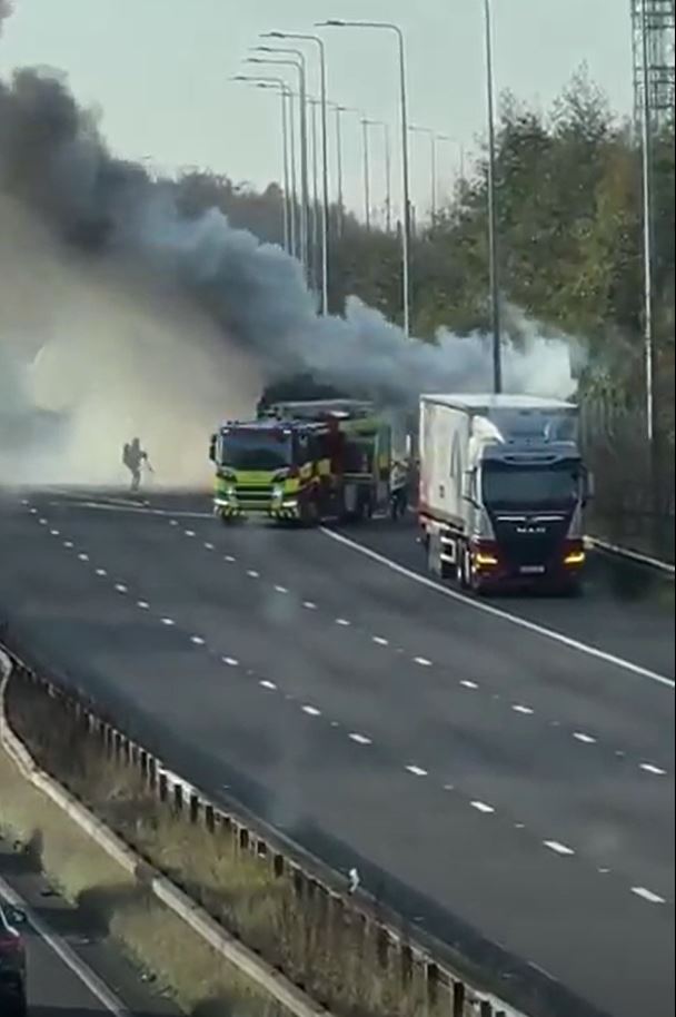 A firefighter is seen battling the horror blaze