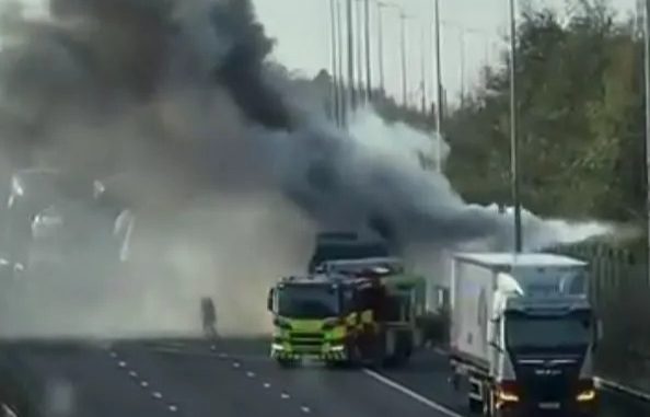 Moment lorry explodes into HUGE fireball on M62 as plumes of black smoke fill sky sparking traffic chaos for thousands