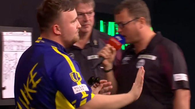 Luke Littler refuses to celebrate after surviving match dart to edge out Mike De Decker 10-9 in Grand Slam of Darts epic