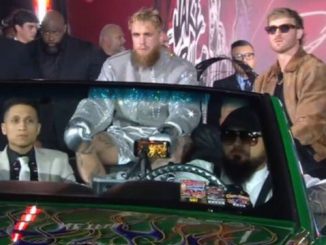 Jake Paul BOOED as he comes out for Mike Tyson ringwalk in CAR and $1m diamond-encrusted outfit