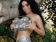 Charli XCX poses topless in sexy shoot following Saturday Night Live appearance