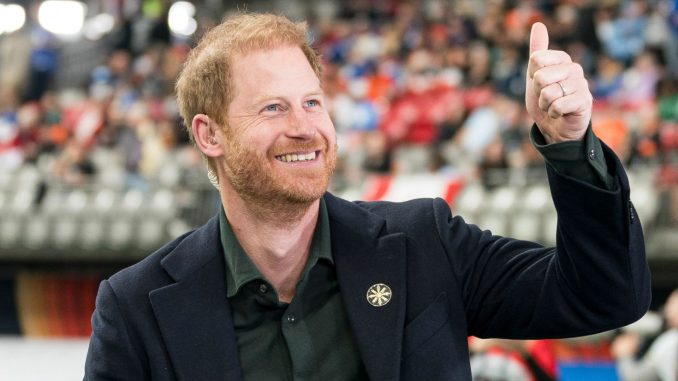 Smiling Prince Harry gives thumbs up to Canadian football fans in ANOTHER public appearance without Meghan – The Scottish Sun