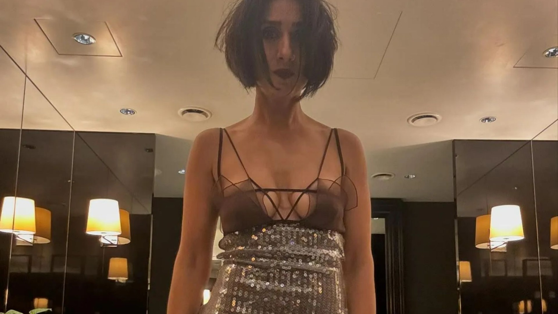 The One Show star stuns fans in racy see-through dress with plunging neckline and thigh-split as they say ‘holy smokes’