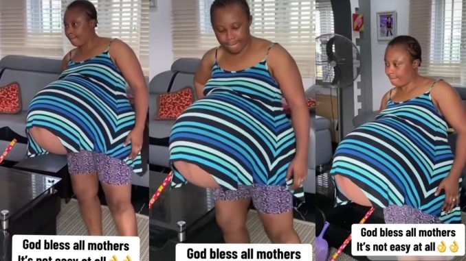 Pregnant lady shows off her huge baby bump, video stirs shock