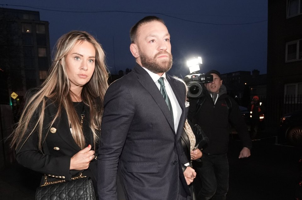 Conor McGregor and partner Dee Devlin leaving the High Court after losing his civil case