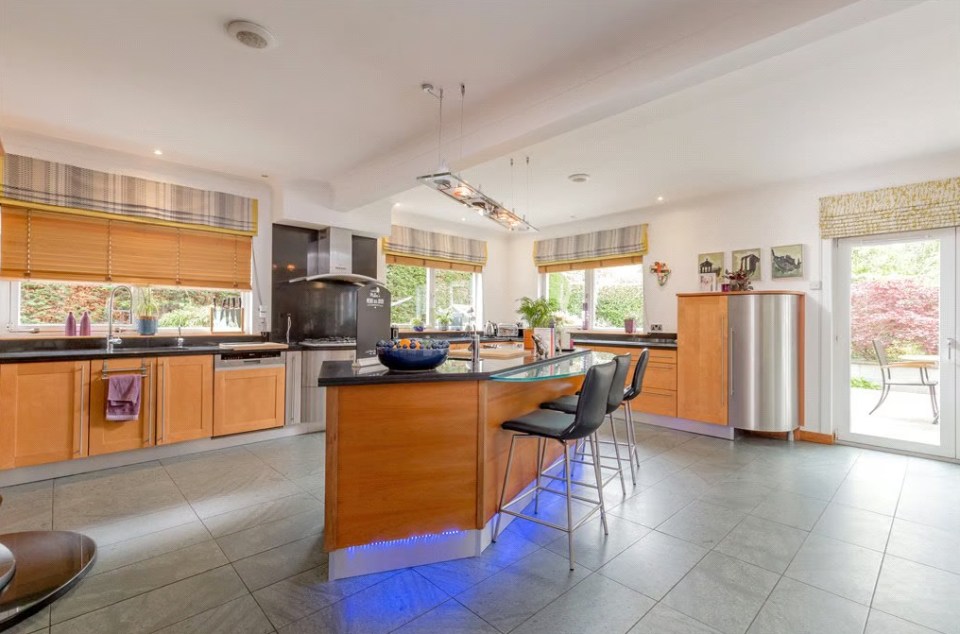 The five-bedroom mansion also has a modern dining kitchen