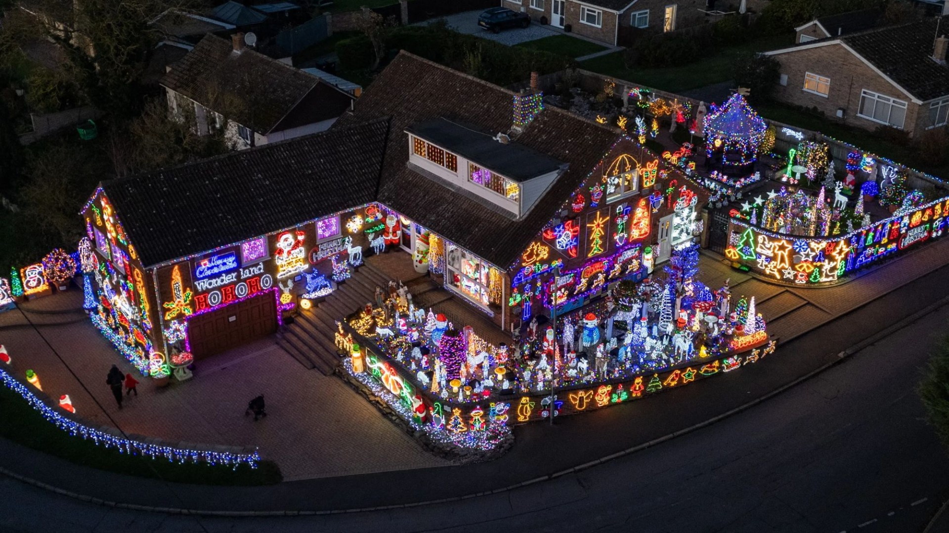 We've been covering our house in Christmas lights for 12 years to raise money for charity and don’t plan to stop