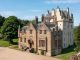 Scots comedian who earned megabucks in USA rakes in £9m after selling off portfolio of castles and mansions