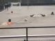 Non-league stars go SWIMMING on their pitch as entire stadium covered in water as Storm Bert wreaks havoc