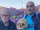 Bizarre moment football fans turn up to cup final with HUMAN SKULL of grandfather and say 'we take him everywhere'