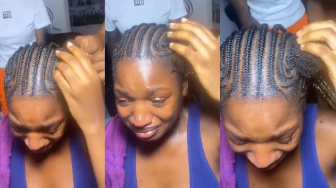 Lady brɘaks down in tɘars while braiding natural hair with extensions (WATCH)