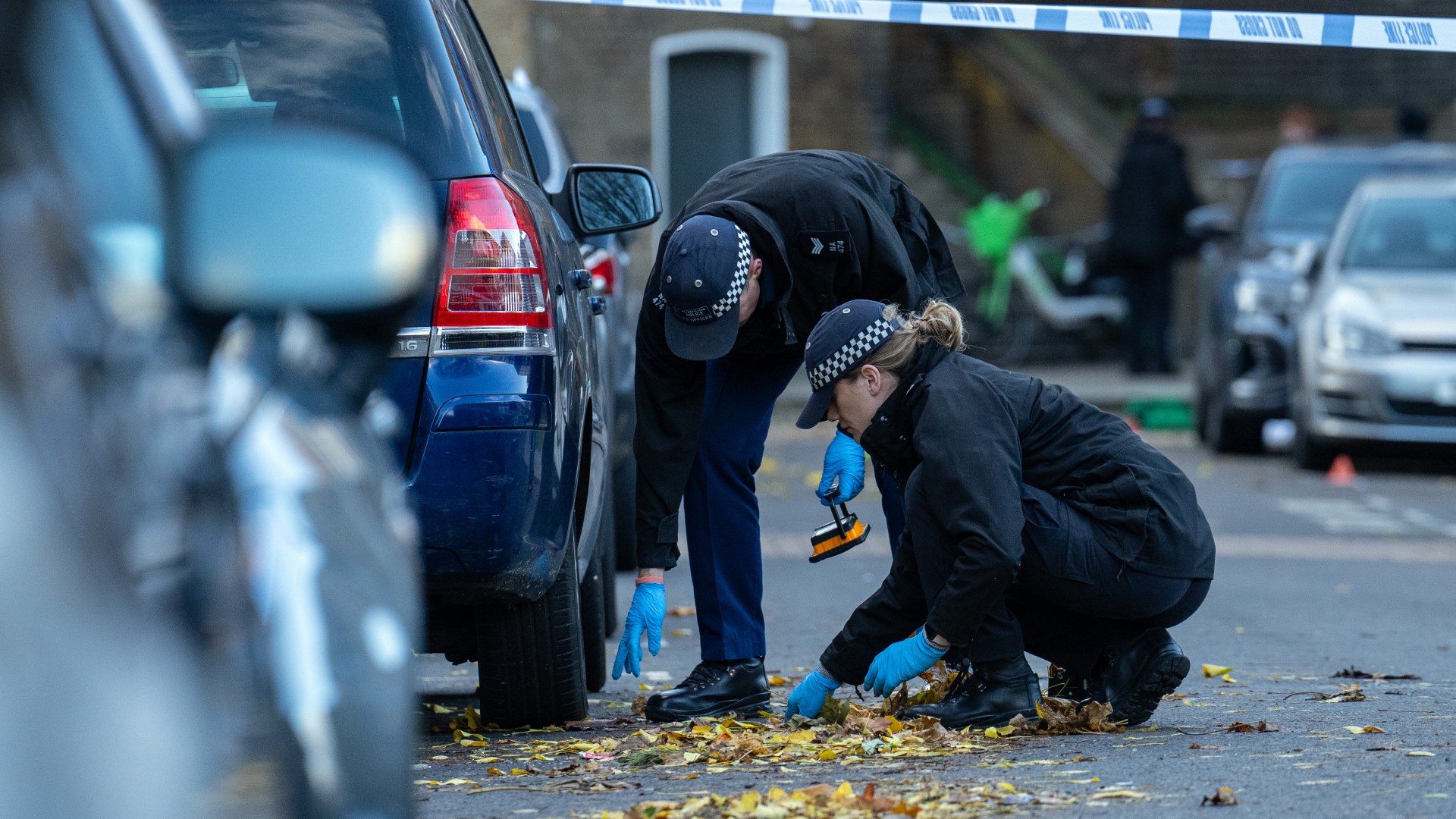 Gunman 'shot at family's car with pistol in gang hit' as girl, 8, injured - with parents & sibling, 2, caught in horror