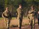 Watch camo-clad Prince William shoot sniper rifle on gun range and fly drone in visit to Salisbury Plain